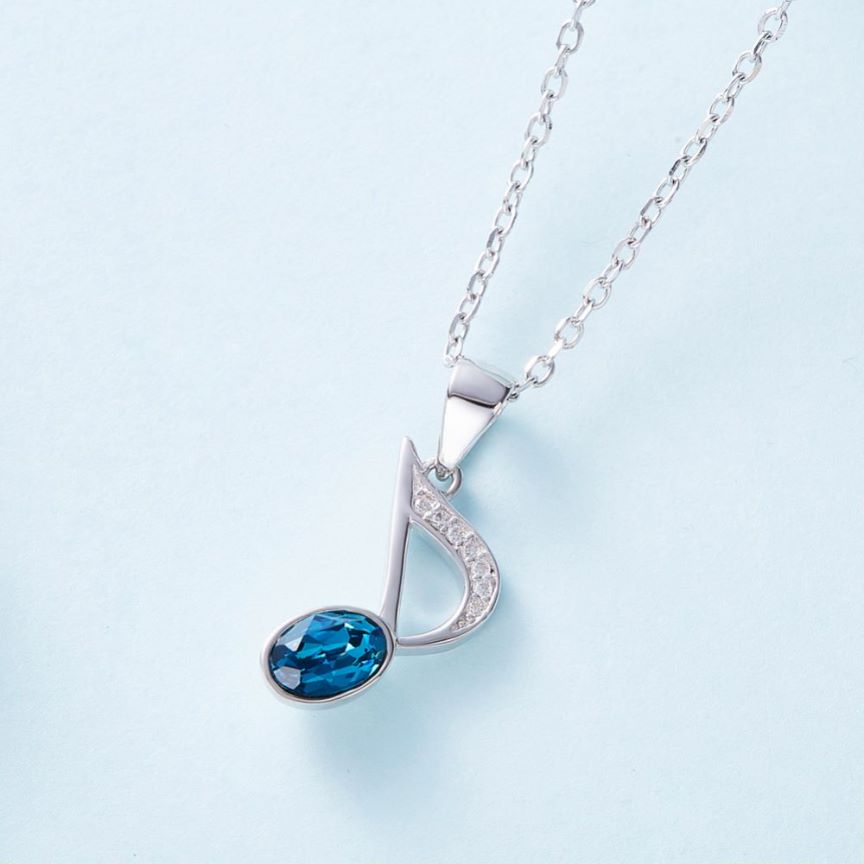 Stylish music note pendant necklace featuring an 8th-note-shaped pendant adorned with sparkling blue crystal, crafted from high-quality 925 silver and rhodium plated for lasting shine.